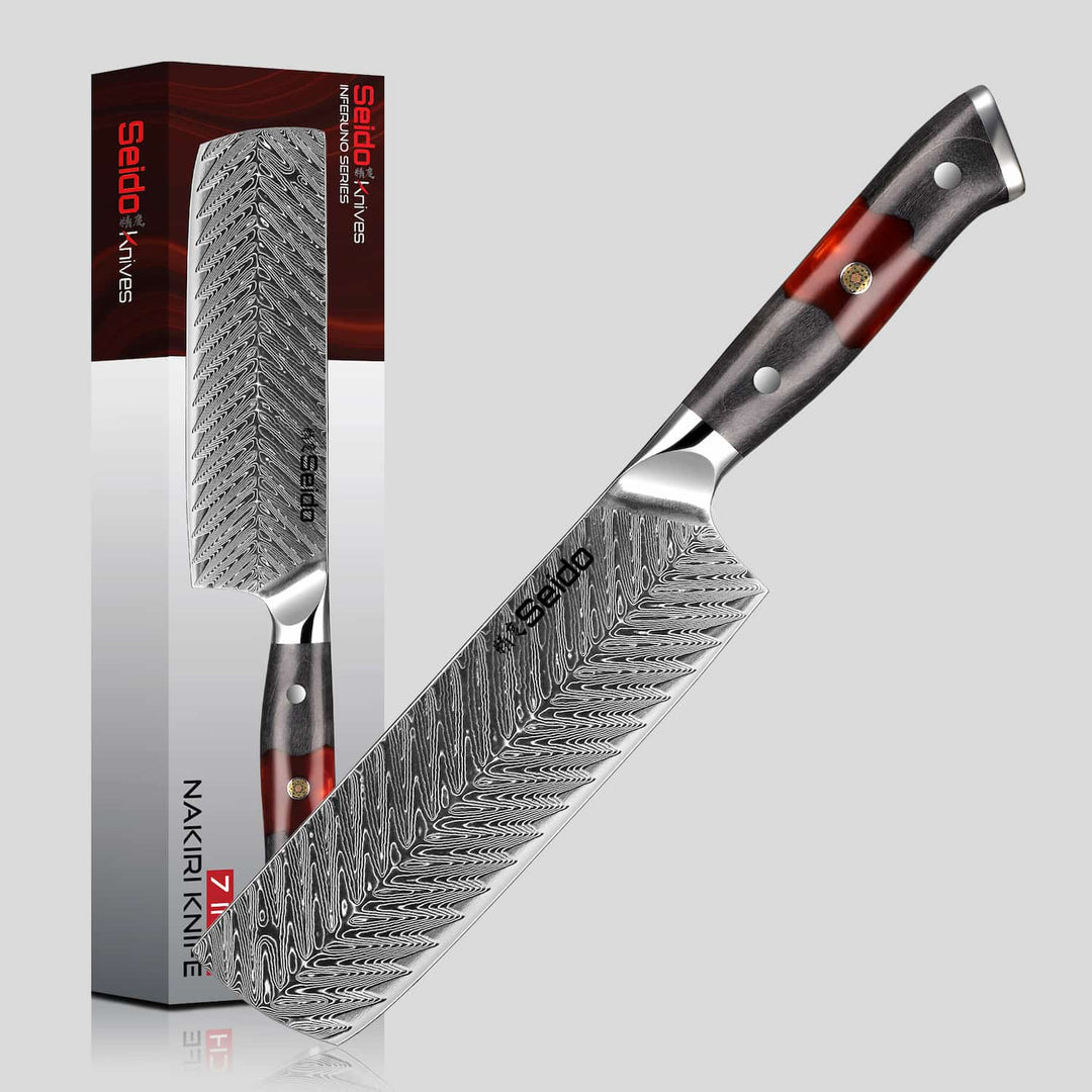 Sedio Nakiri knife with a detailed blade and wooden handle, displayed in front of its packaging.