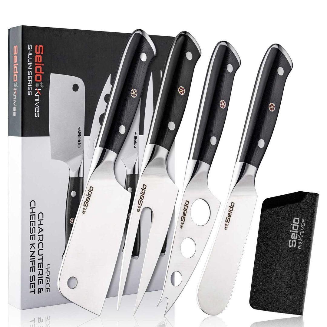 Set of 4 charcuterie tools, with black G10 handles and a sheath, displayed in front of their packaging.