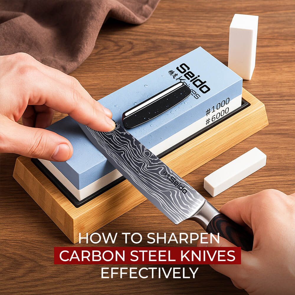 A person sharpening a Damascus carbon steel knife on a dual-grit whetstone.
