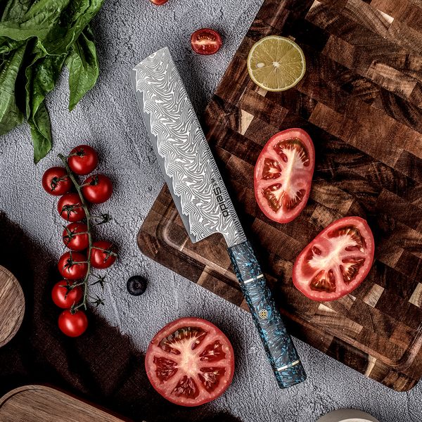 Epokishi AUS-10 Nakiri Knife on a cutting board with ingredients