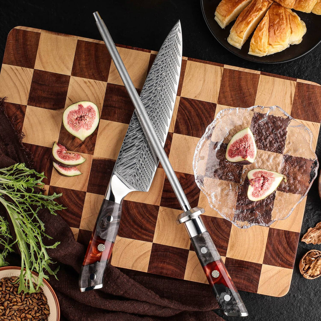 The Inferuno Series AUS-10 Gyuto Chef knife laying and under sharpening rod, laying on a cutting board with ingredients.