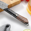 Close-up of the black resin and maple wood handle