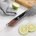 Close-up of the black resin and maple wood handle