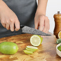 Close view of the Titan Petty Knife in use