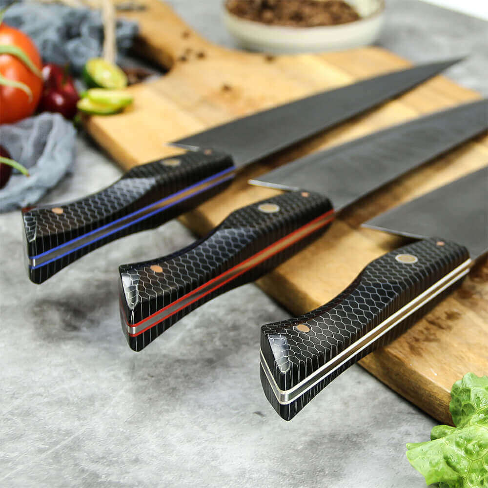 A trio of razor-sharp Moretsuna Japanese knives resting on a cutting board, surrounded by vibrant vegetables and juicy meat.