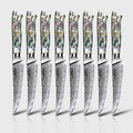 The 8-piece Awabi steak knife set with Damascus steel blades on a white background