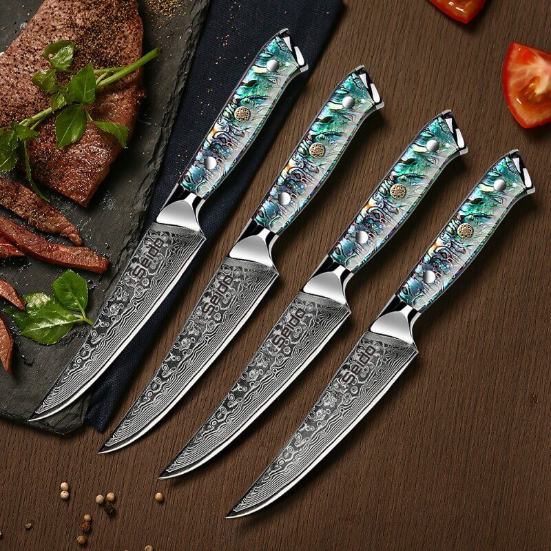 Four uniquely designed Awabi Straight Edge Steak Knives by Seido Knives, perfect for adding style to your dining experience!