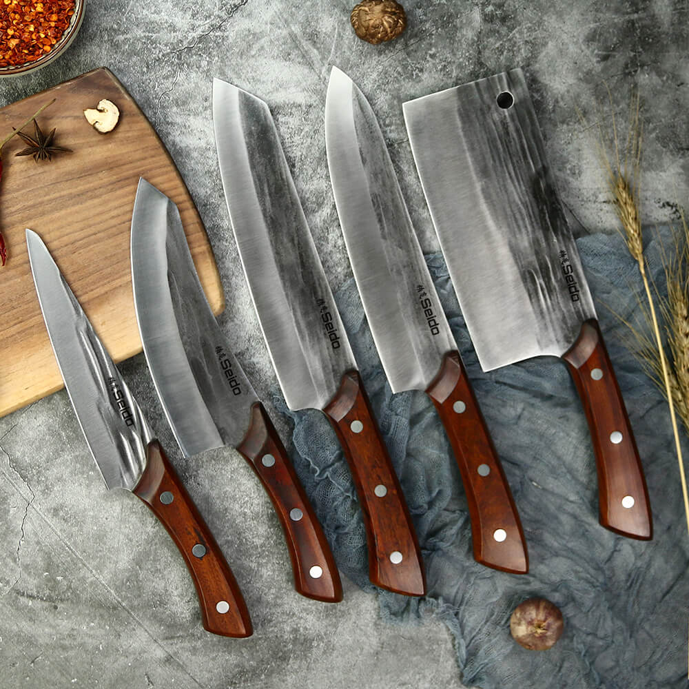 Caveman Butcher Knife Set: A collection of cutting tools by Seido Knives. Unleash your inner caveman chef with these blades!