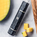 Grey epoxy resin and carbon-fiber Epokishi handle close-up with mosaic pin.