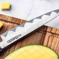 Epokishi petty knife with a focuss on the AUS-10 Damascus blade angle showing V-shaped 12° grind.