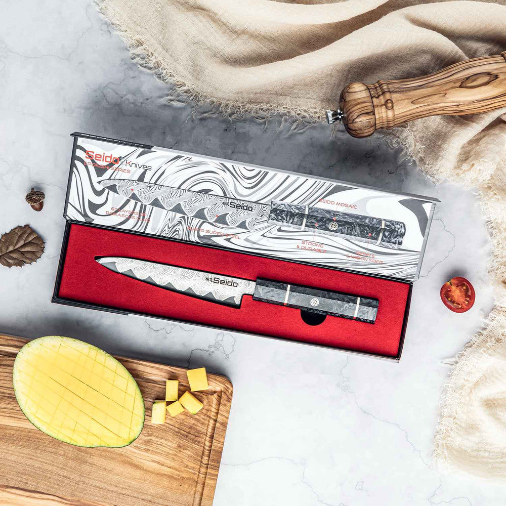 The Epokishi series Petty knife in a branded seido knvies storage gift box packaging.