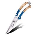 Shears with wooden and blue handles on a white background