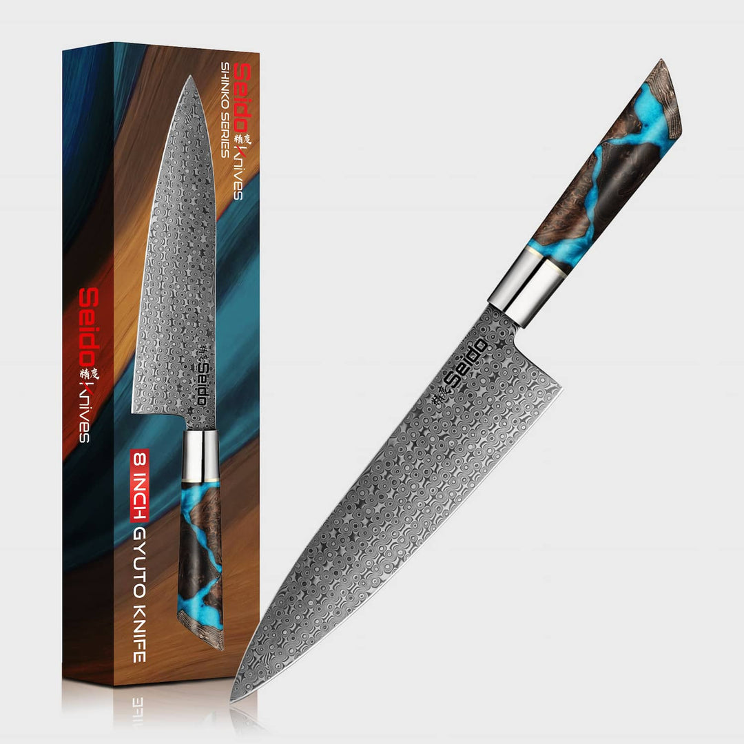 Shinko Series 8-inch Gyuto knife with decorative handle next to its packaging on a white background.