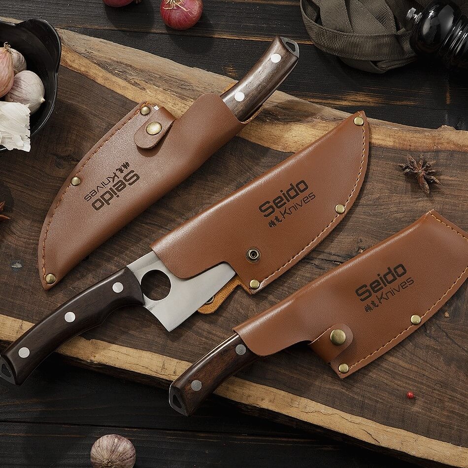 Torio 3-piece Butcher Knife Set secured in leather sheaths