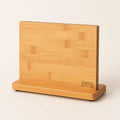 Bamboo Magnetic Knife Block isolated on a warm light background