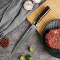 Full Master 8-inch slicing knife displayed with steak, citrus and kitchen ingredients