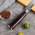 Close-up of the Master Series red and black pakkawood slicing knife handle