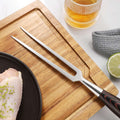 Close-up of the long tapered stainless-steel tines on the Master carving fork