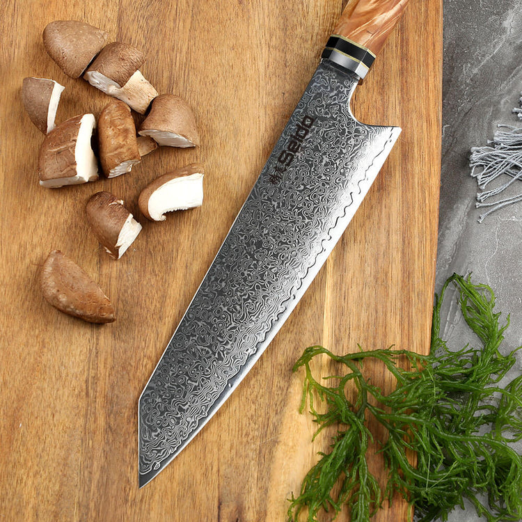 https://seidoknives.com/cdn/shop/files/seido-kiritsuke-Japanese-Damascus-steel-Chef-Knife-VG-10-Steel_2_1_750x750.jpg?v=1693073952