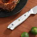 White turquoise handle with polished pins and mosaic accent