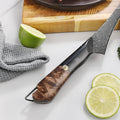 Close-up of the Titan Boning Knife black resin and figured maple handle