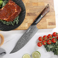 Titan Gyuto chef knife arranged on an end-grain cutting board