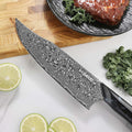 Detailed view of the Titan Gyuto Damascus blade pattern and Seido marking