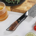 Close-up of the Titan Gyuto black resin and figured maple handle