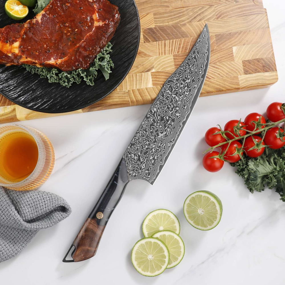 Titan 8-inch Gyuto chef knife beside steak and fresh ingredients