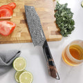 Titan Nakiri knife and sheath flat lay