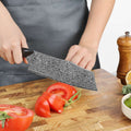 Titan 7-inch Nakiri knife slicing vegetables