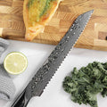 Close-up of the Titan Serrated Knife cutting edge and serrations