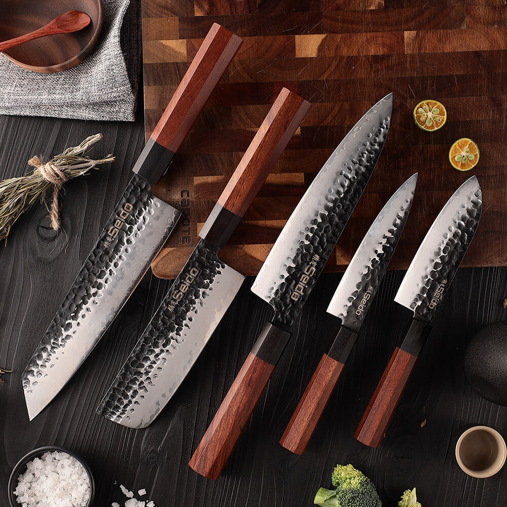 Enhance your culinary skills with the Hageshi AUS10 Japanese Knife Set by Seido Knives, showcased on a cutting board.