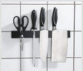A sleek magnetic knife holder by Seido Knives, perfect for keeping your knives organized and within reach.