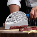 Kaiyo Cleaver cutting meat