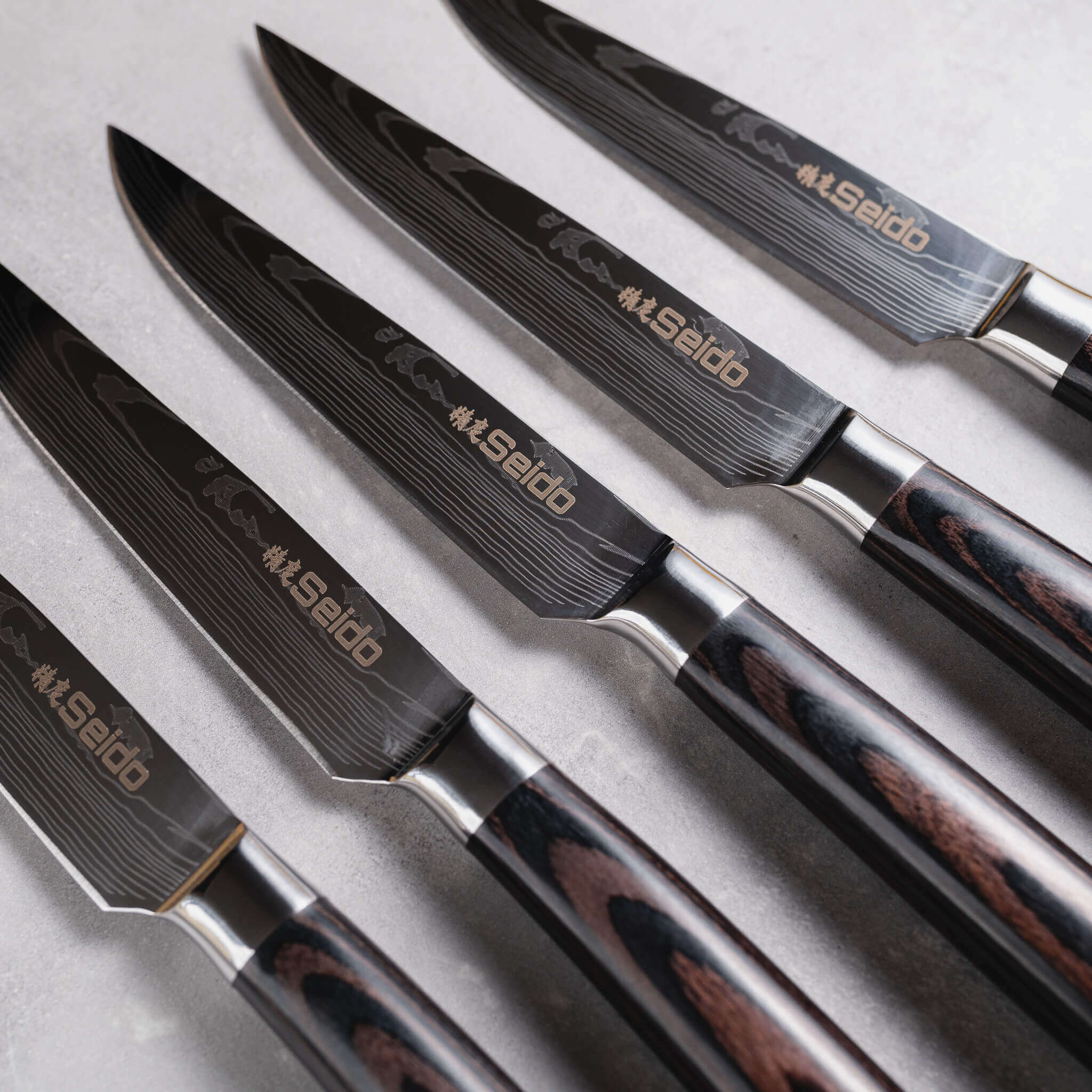 Seido Knives' sleek non-serrated Straight-Edge Steak Knives: perfect for a smooth and precise cut.