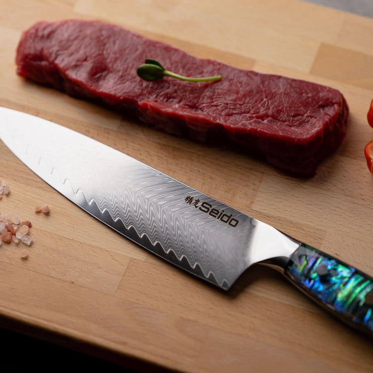 https://seidoknives.com/cdn/shop/products/SeidoknivesAwabiGyutoDamascusSteelChefKnife0733_750x750.jpg?v=1655259563